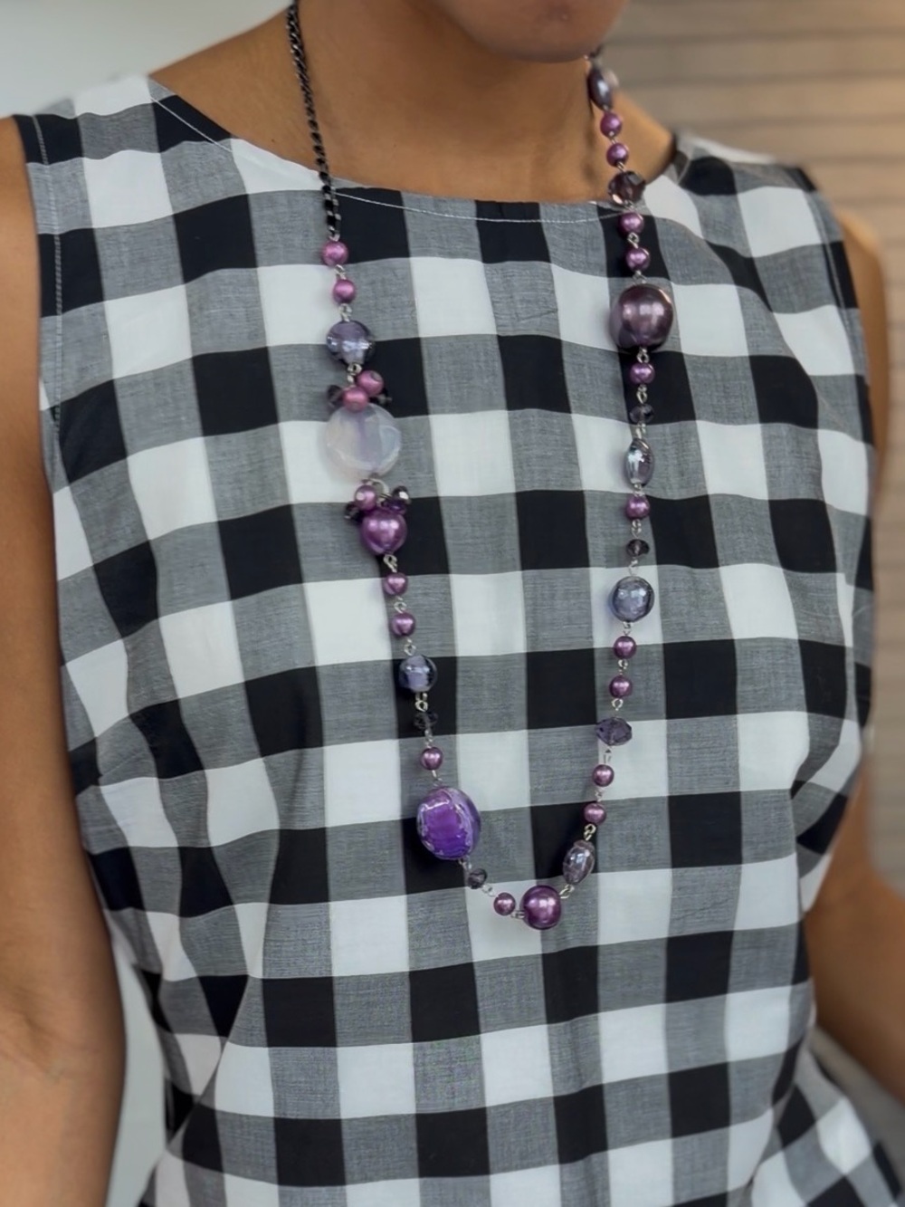 Colorful purple necklace with different stones